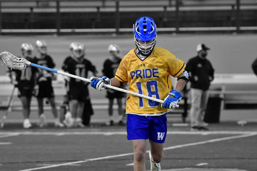 Cole on the lacrosse field