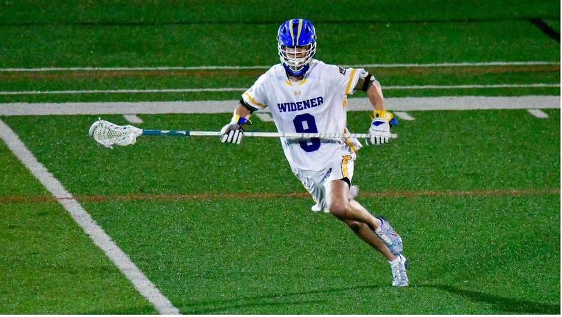 Cole playing lacrosse